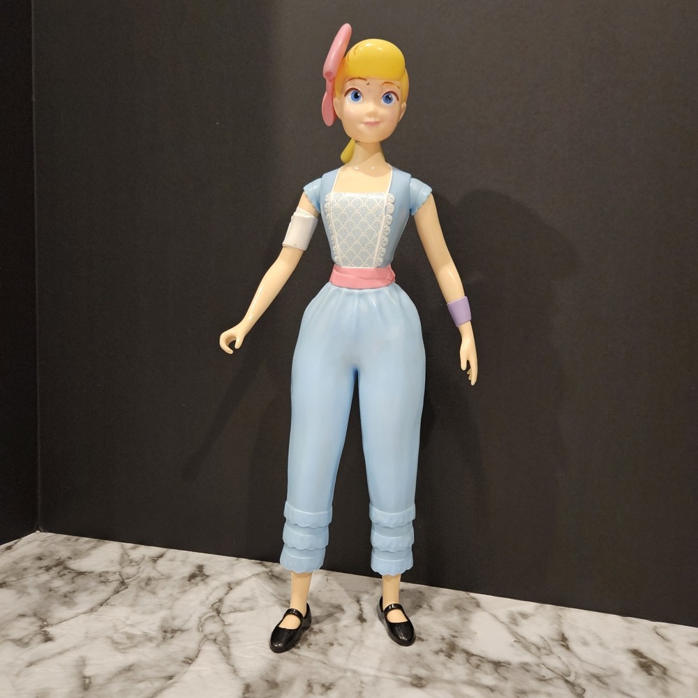 Charming Action Figure in Blue and Pink Outfit